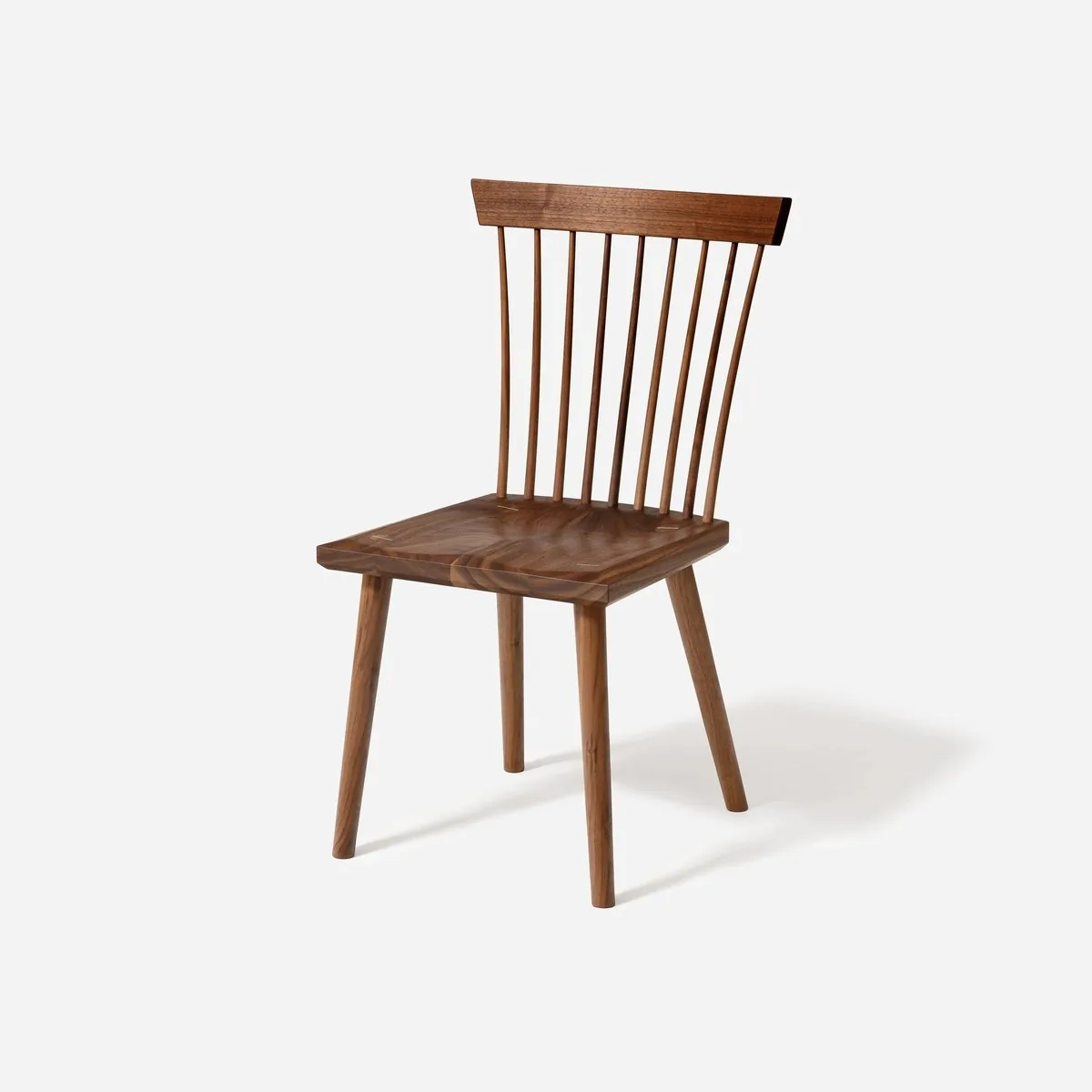 The Spindle Back Chair by Sustar Woodworks.